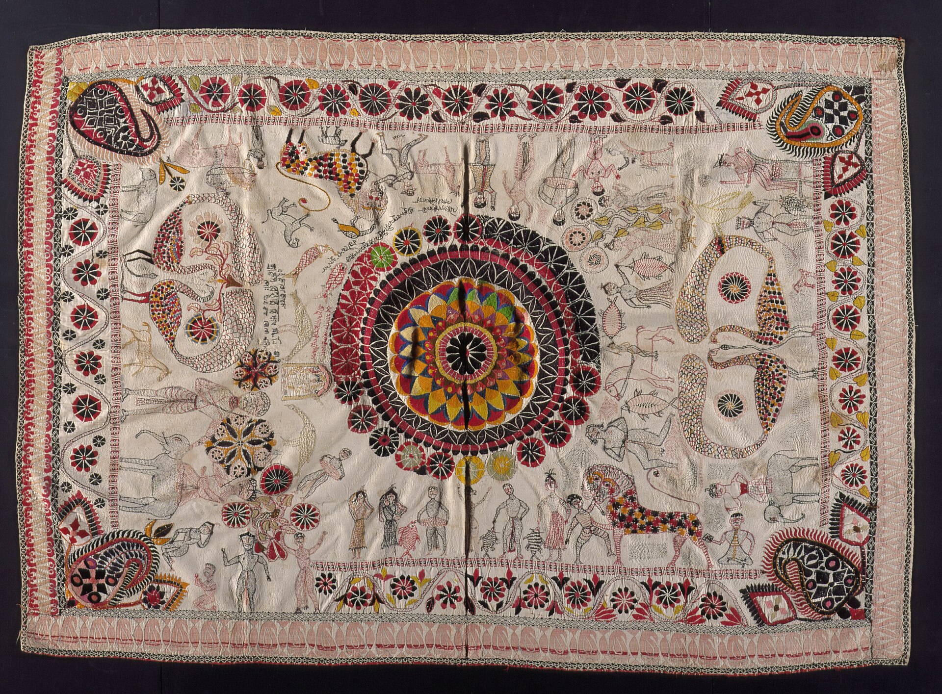 Historic Bengali kantha quilt with detailed figurative embroidery