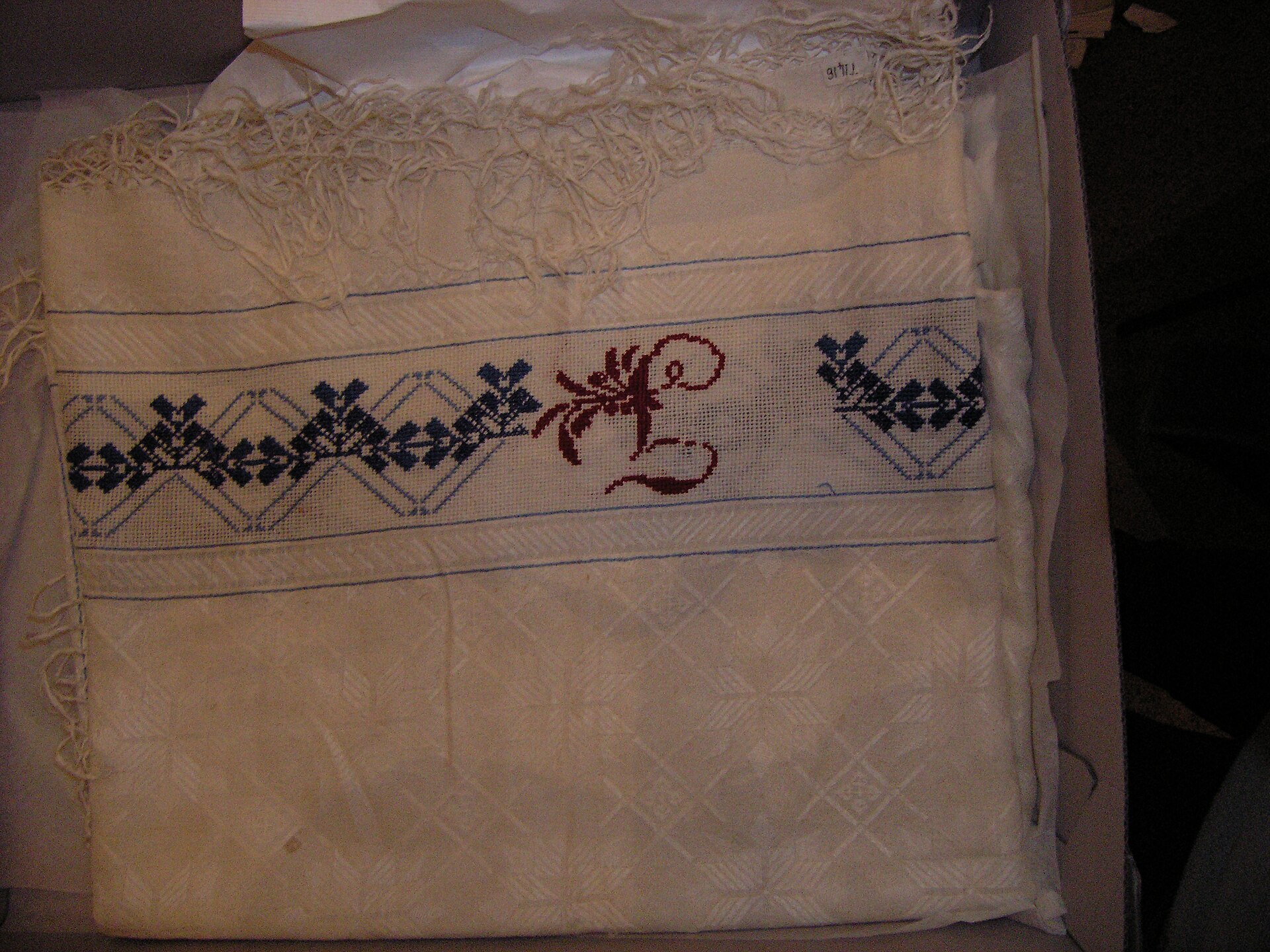 Decorative handmade table cloth with a patterned border